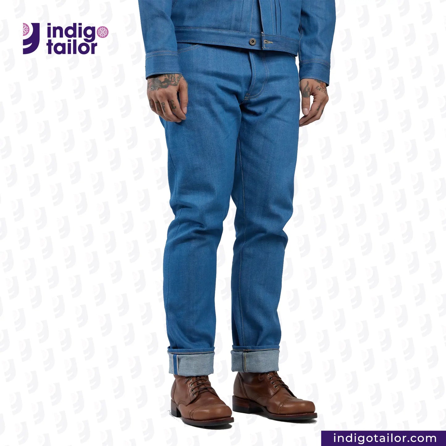 Person wearing a AOZORA SKY BLUE DENIM outfit with 'Indigo Tailor' logo.