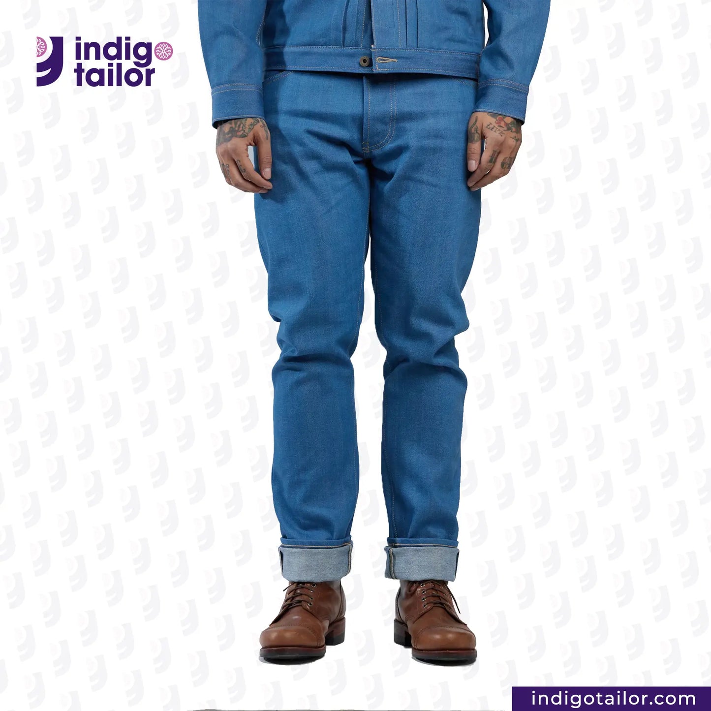 Person wearing AOZORA SKY BLUE DENIM pants and a matching jacket with 'indigotailor' branding.