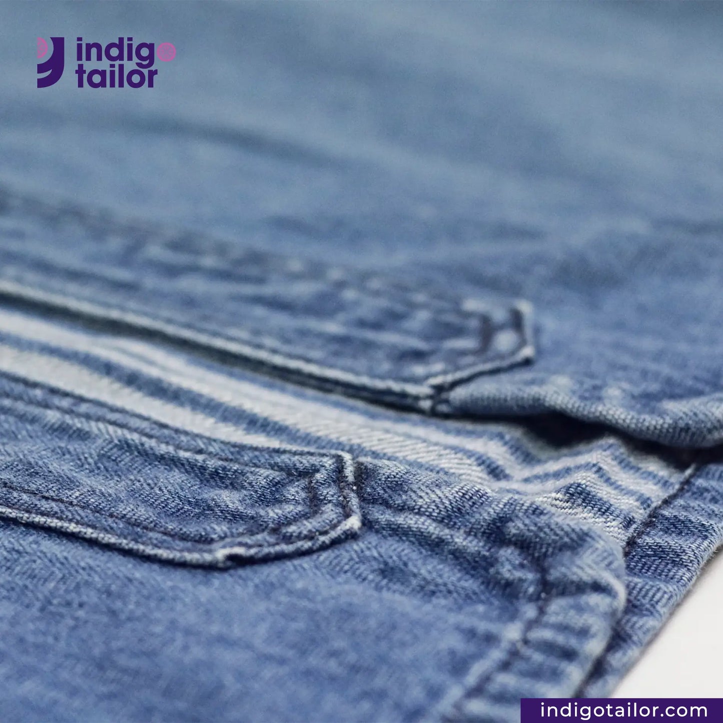 Close-up of BASEBALL NORAGI (VINTAGE BLUE) with 'indigotailor' logo and website.