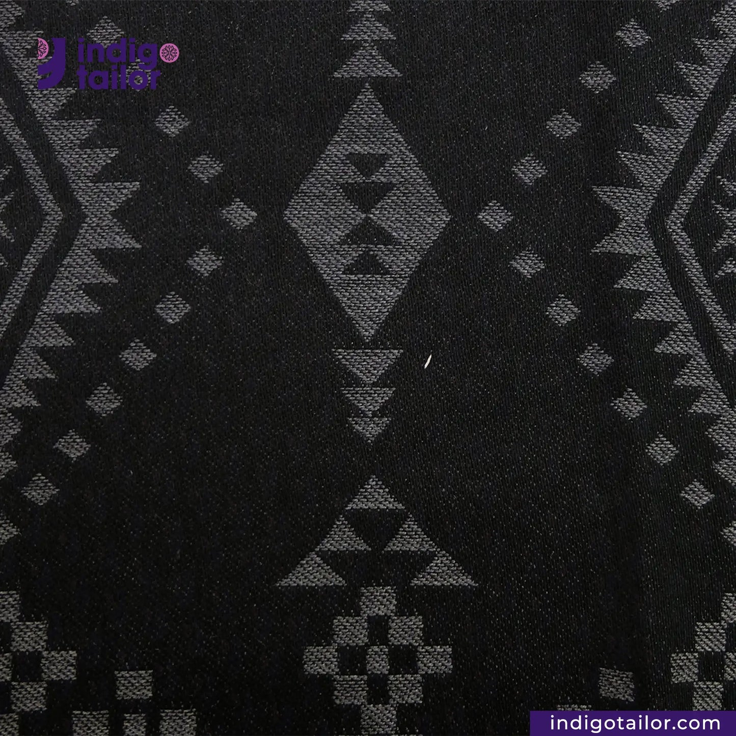 BLACK NATIVE AMERICAN JACQUARD fabric with geometric pattern, brand 'Indigotailor' visible