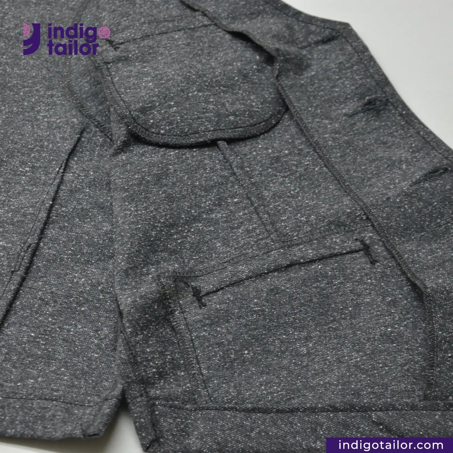 BLACK TWEED WORK VEST with a brand logo on a white background