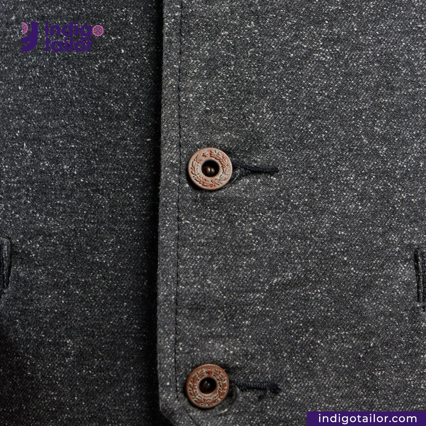 Close-up of a BLACK TWEED WORK VEST with buttons, featuring the brand 'Indigo Tailor'.