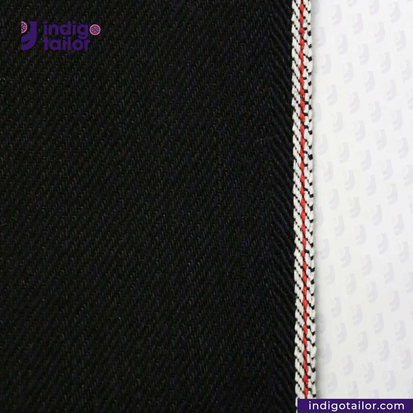 Close-up of BLACK X BLACK SELVEDGE DENIM fabric with Indigotailor logo.