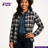 Woman wearing a BRUSHED FLANNEL INDIGO/BEIGE/GREY CHECK shirt with Indigo Tailor logo on a white background