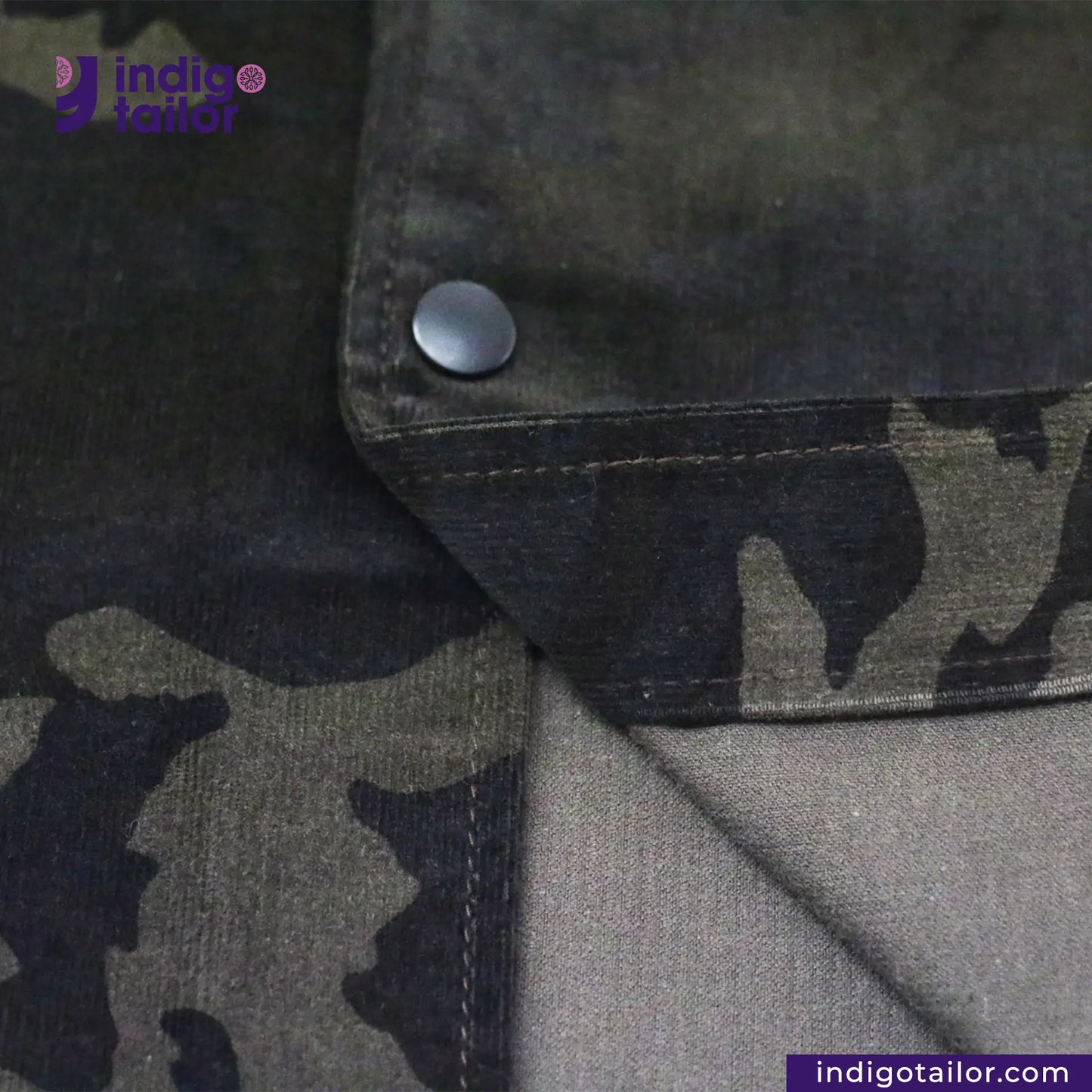 CORD CAMO OVERSHIRT Camouflage fabric with a button, featuring the brand 'Indigotailor' at the top.