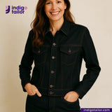 Woman wearing a DARK INDIGO x BLACK SELVEDGE DENIM jacket with Indigotailor logo and website on beige background