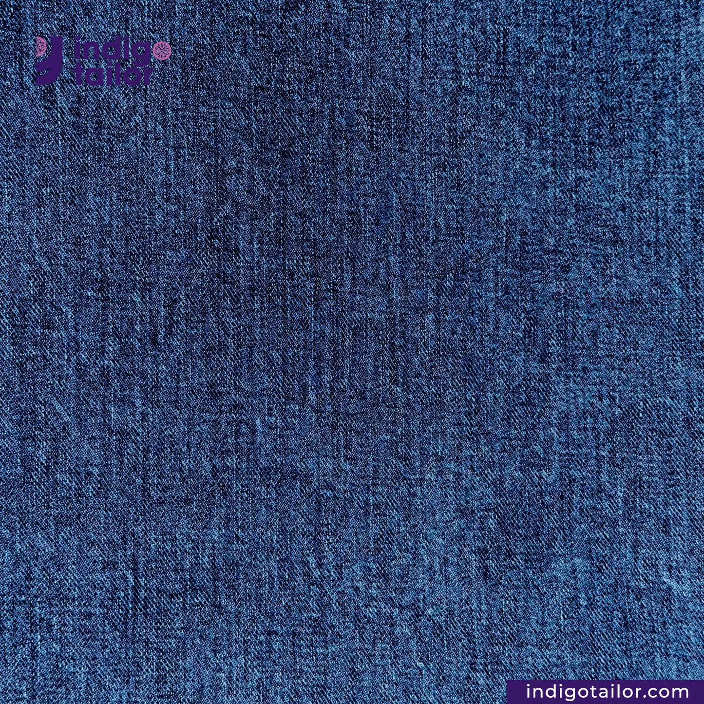 Close-up of DARK WASHED SELVEDGE DENIM LIME SELVEDGE fabric with 'indigotailor' branding.