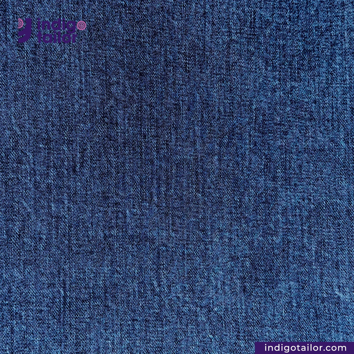 Close-up of DARK WASHED SELVEDGE DENIM LIME SELVEDGE ID fabric with 'indigotailor' branding.