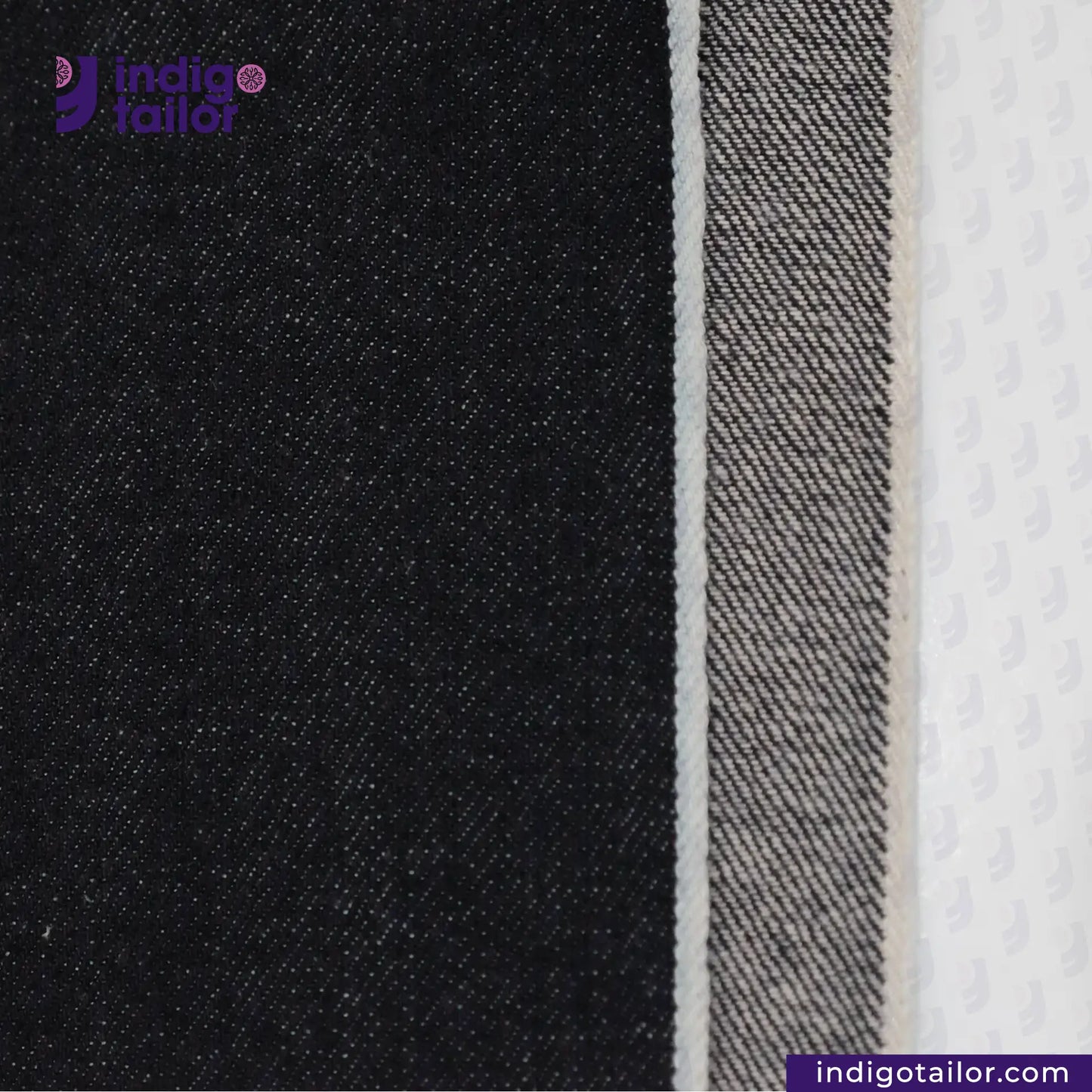 Close-up of DEEP INDIGO OMBRÉ CAST DENIM fabric with Indigotailor logo and website.