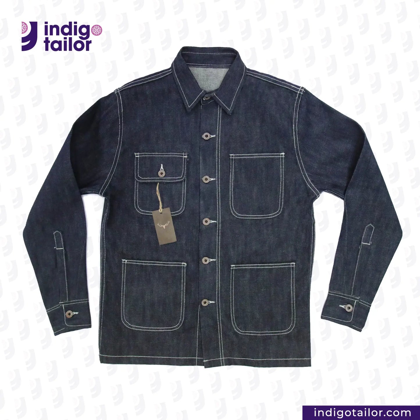 DENIM CHORECOAT jacket with a tag on a light gray background, featuring the Indigotailor brand.