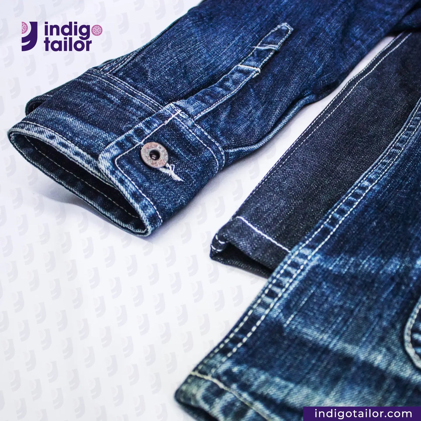 Folded DENIM CHORECOAT jeans with 'indigotailor' branding on a textured white background
