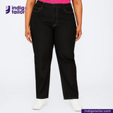 Person wearing DOUBLE BLACK OREO SELVEDGE DENIM jeans with 'Indigo Tailor' logo and website on a white background