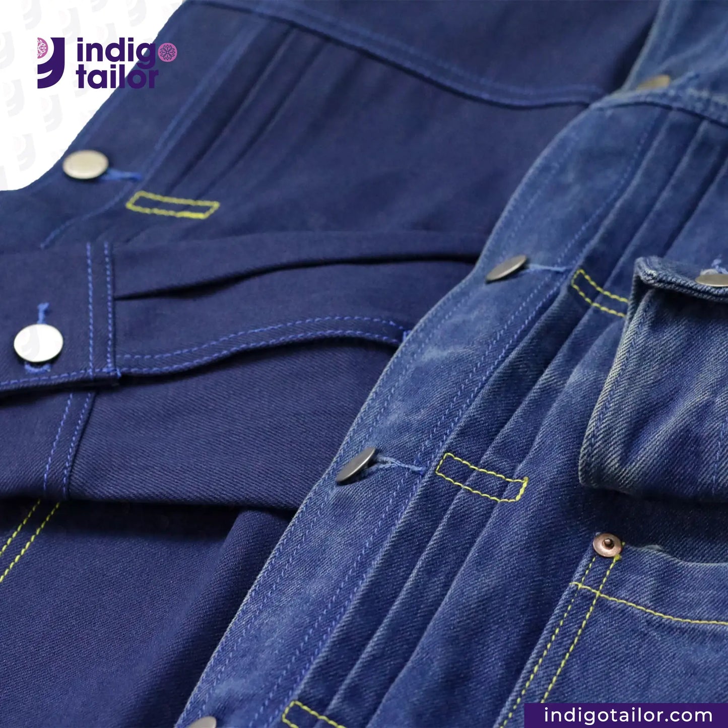 Close-up of a DOUBLE DIPPED TRIPLE PLEAT REPRO denim jacket with visible branding, featuring the 'Indigotailor' logo.