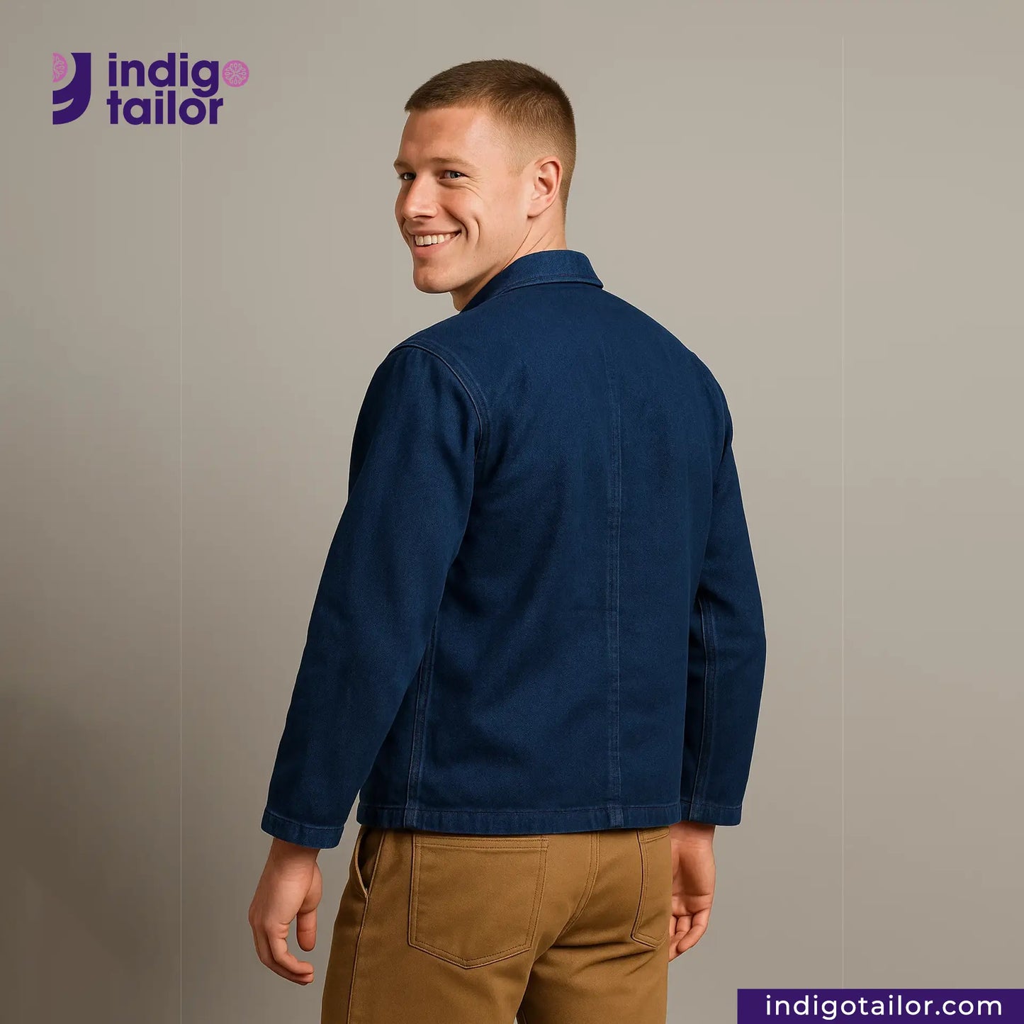 Man wearing a EASY JACKET INDIGO CANVAS with 'Indigo Tailor' logo and website on a gray background