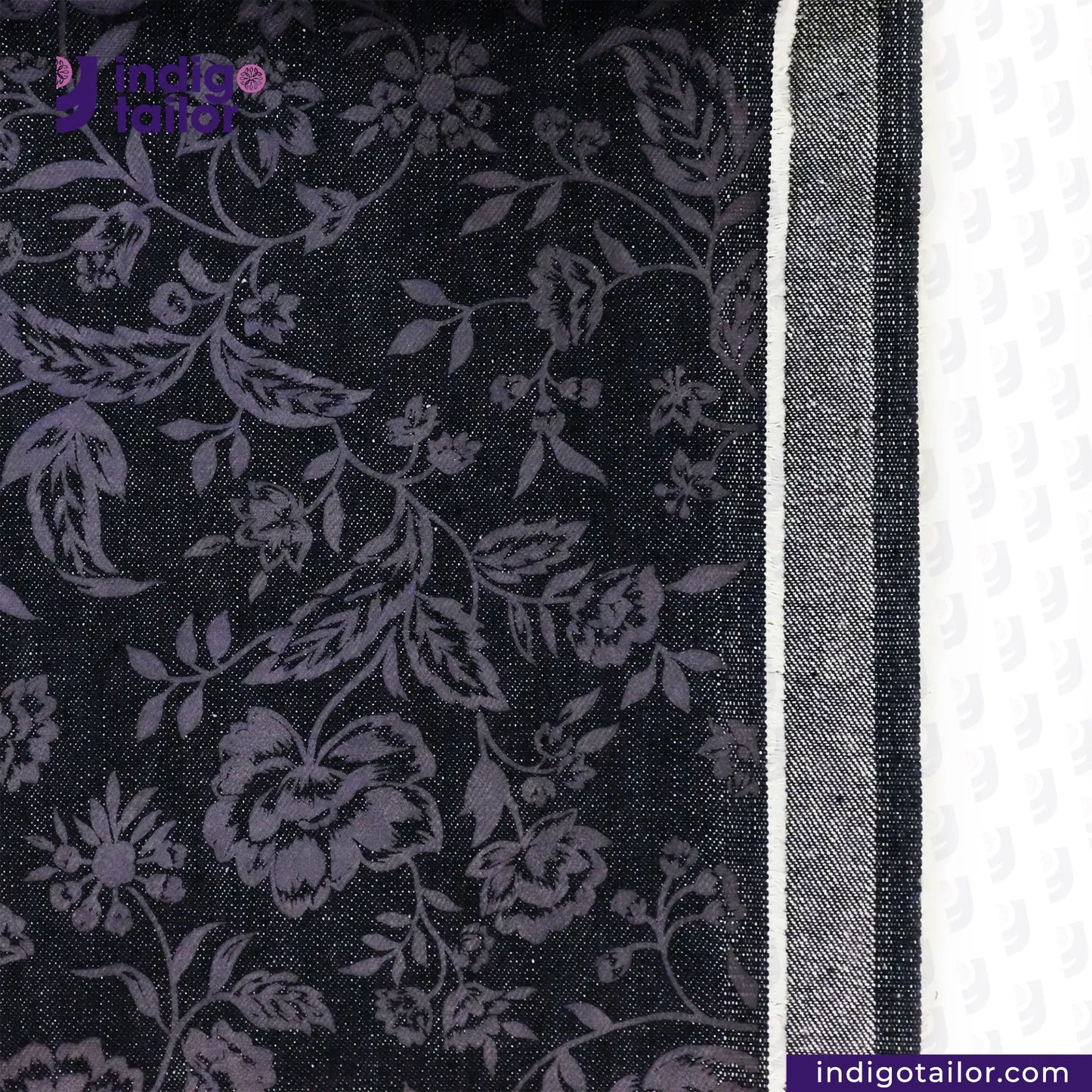 FLORAL EMBOSSED DENIM fabric with floral pattern and white border, featuring Indigo Tailor logo.