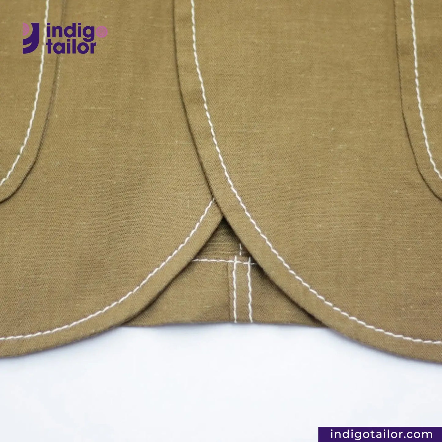 KHAKI HERRINGBONE COVERALL JACKET with white stitching on a white background, featuring the Indigotailor logo.