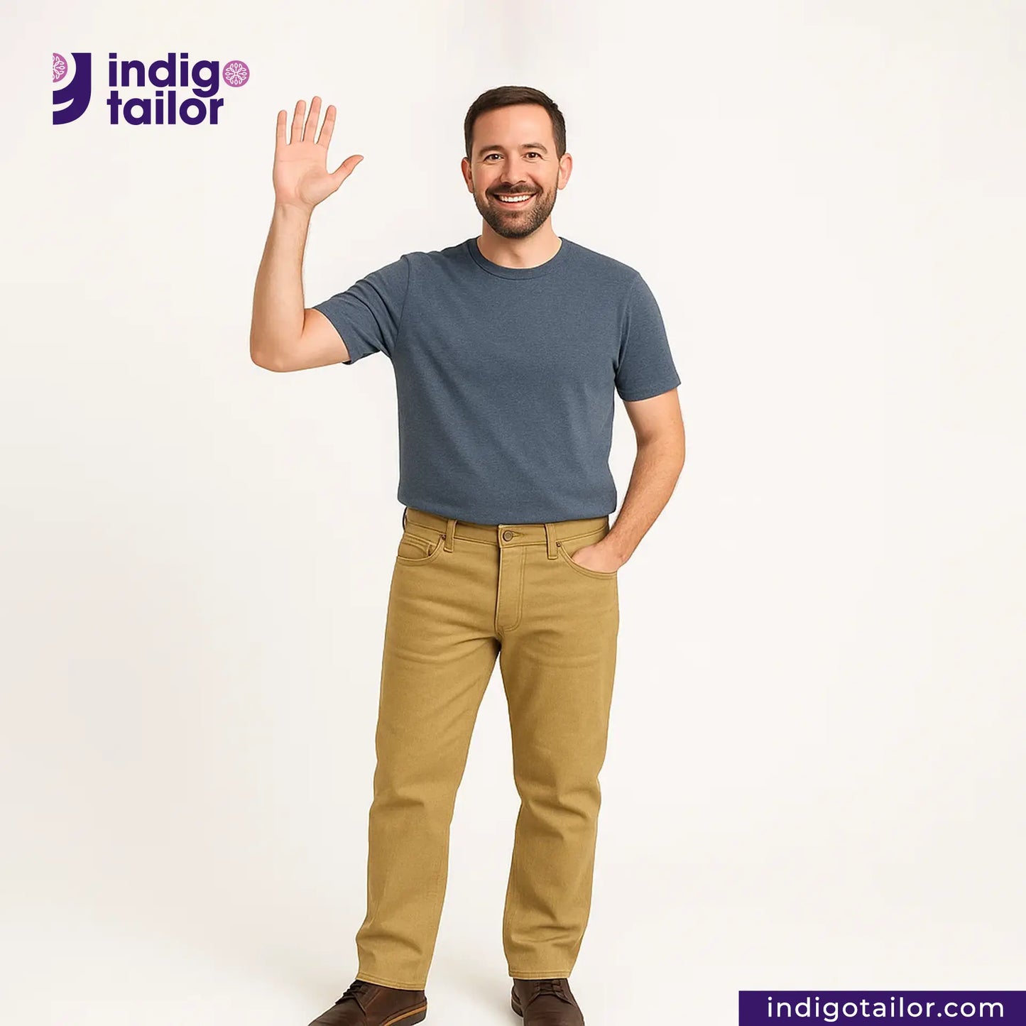 Man wearing a blue shirt and KHAKI SLUB DENIM pants waving, with 'Indigo Tailor' logo above.