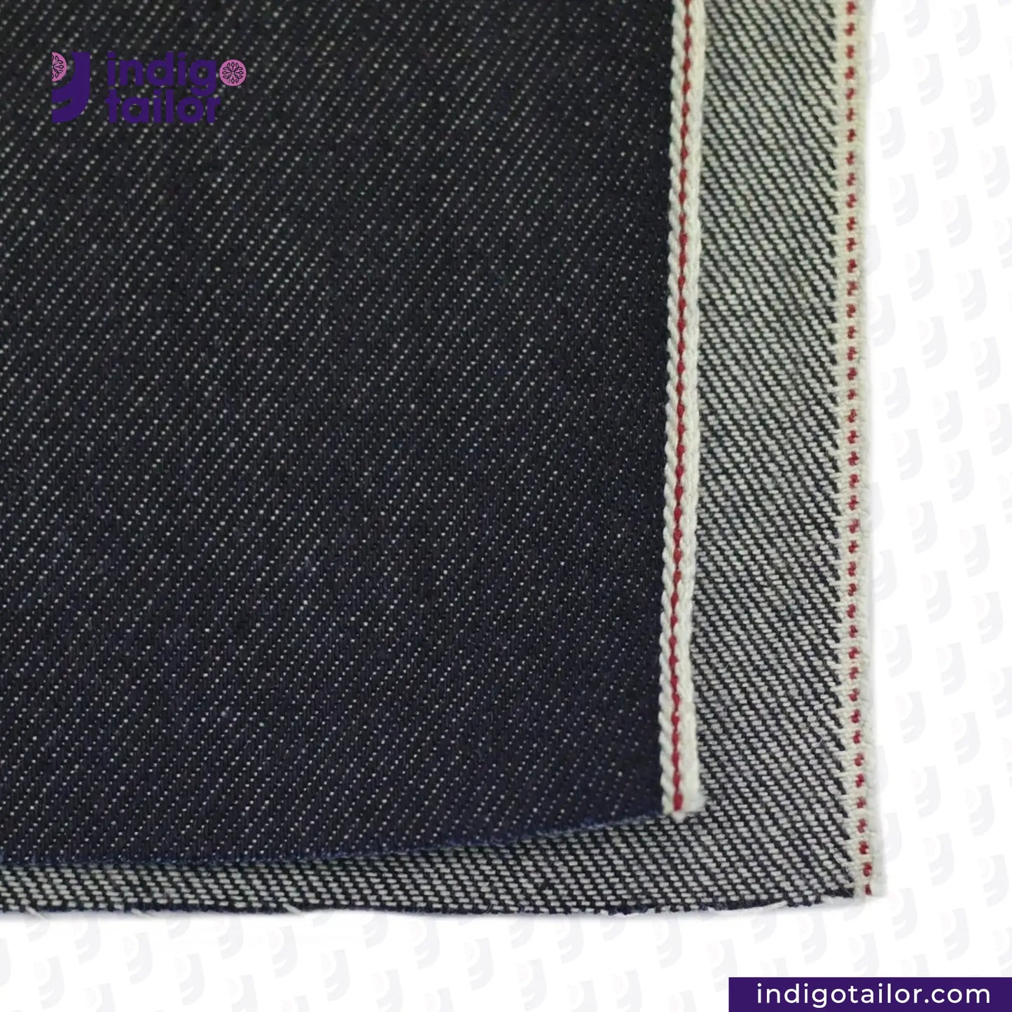 Close-up of KUROKI CLASSIC RED LINE SELVEDGE fabric with a visible brand logo and website address.