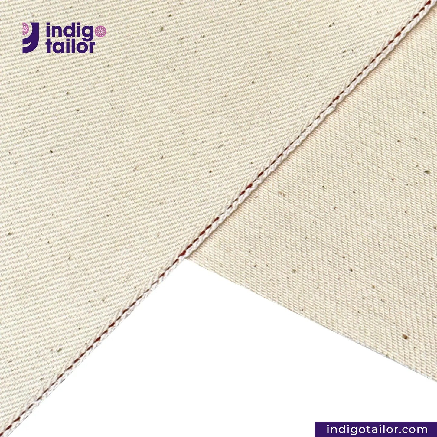 Close-up of LOW TENSION HEAVY KINARI SELVEDGE DENIM fabric with a diagonal seam, featuring the Indigotailor logo.