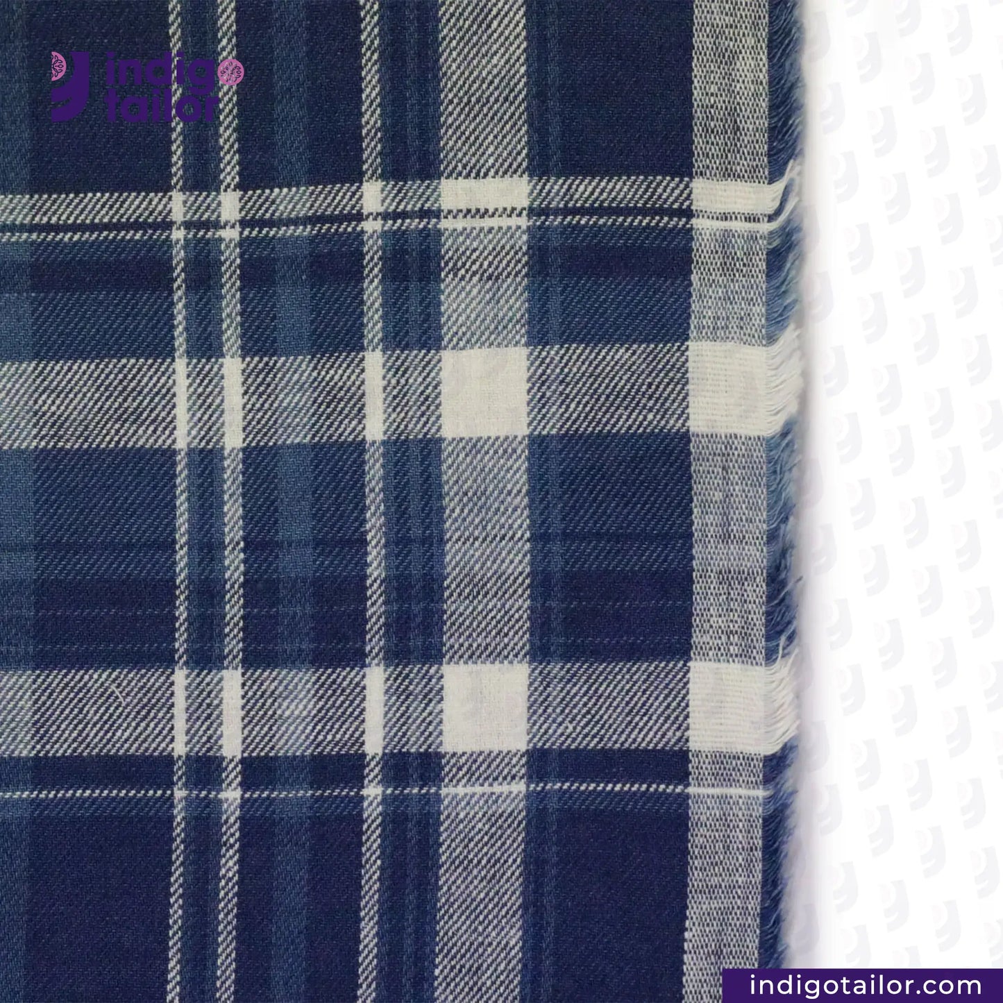 Close-up of MADRAS SPRING BLUE WHITE CHECK fabric with 'Indigo Tailor' branding.