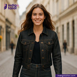 Woman wearing a METALLIC GOLD WEFT SELVEDGE DENIM jacket on a city street with Indigotailor logo.