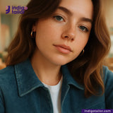 Woman wearing a NATURAL INDIGO DYED SUEDE jacket with Indigotailor logo in the corner.