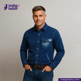 Man wearing a NATURAL INDIGO SUEDE SHACKET shirt with 'Indigo Tailor' logo above