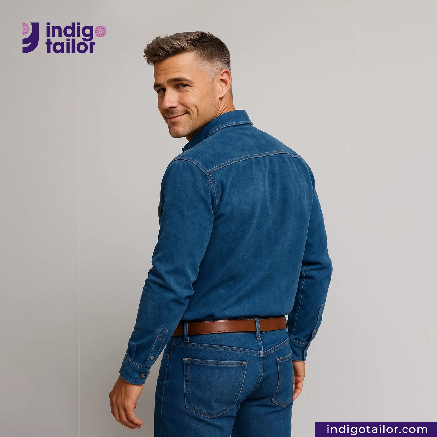 Man wearing a NATURAL INDIGO SUEDE SHACKET shirt and jeans with 'Indigo Tailor' logo.