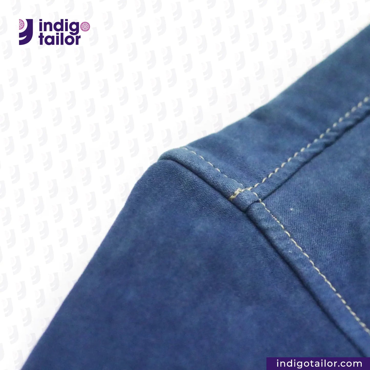 Close-up of NATURAL INDIGO SUEDE SHACKET fabric with 'Indigo Tailor' logo and website text.