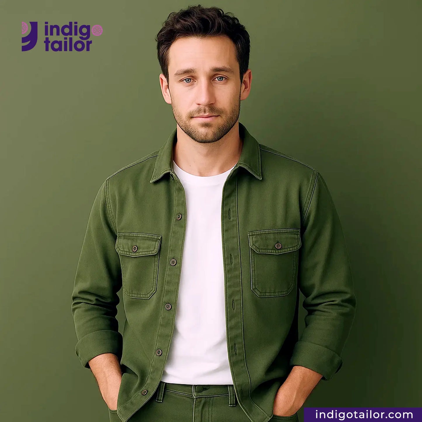 Man wearing a OLIVE SATIN jacket over a white shirt with Indigotailor logo and website on a green background