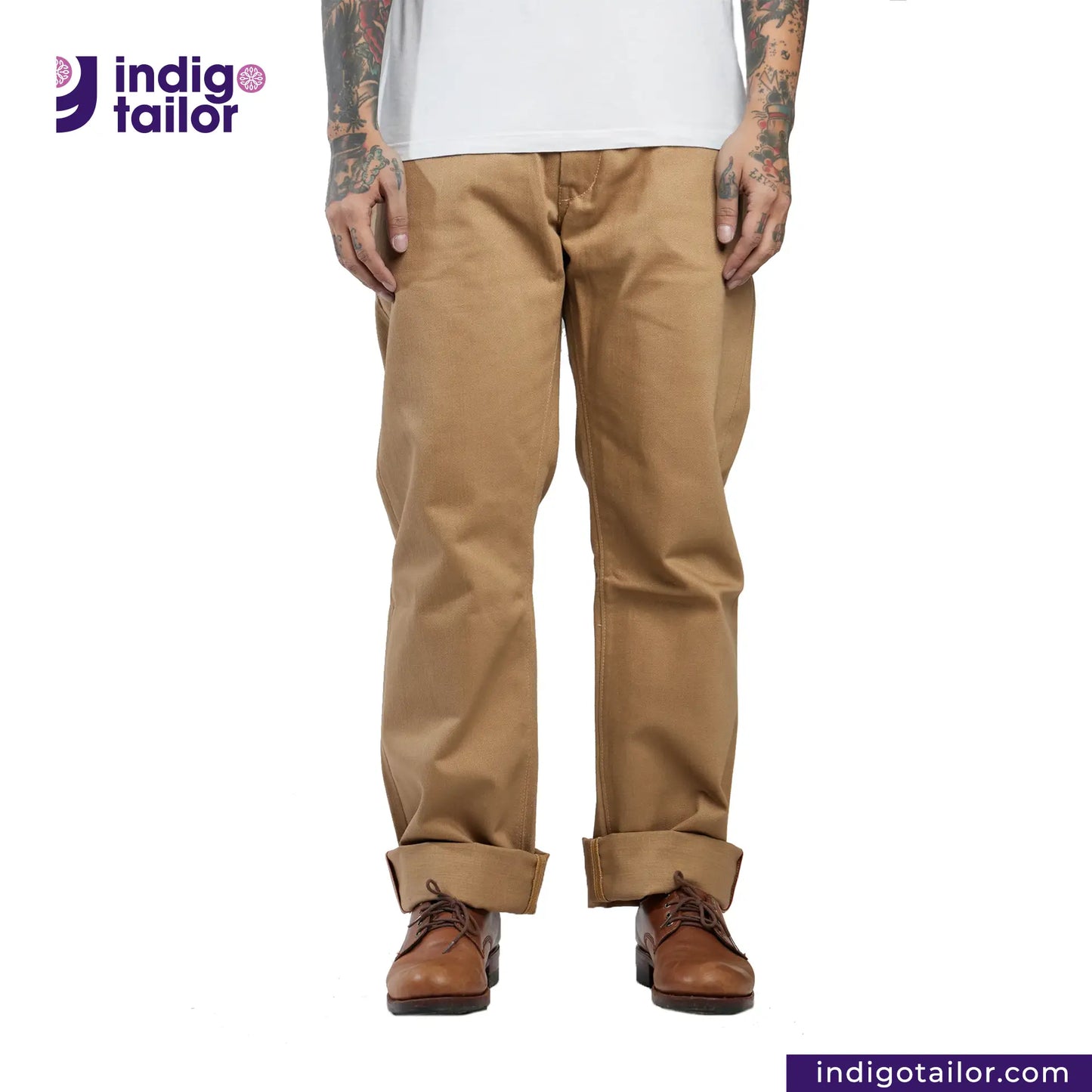Person wearing Officer Trousers (Khaki) pants with 'Indigo Tailor' logo and website on a white background