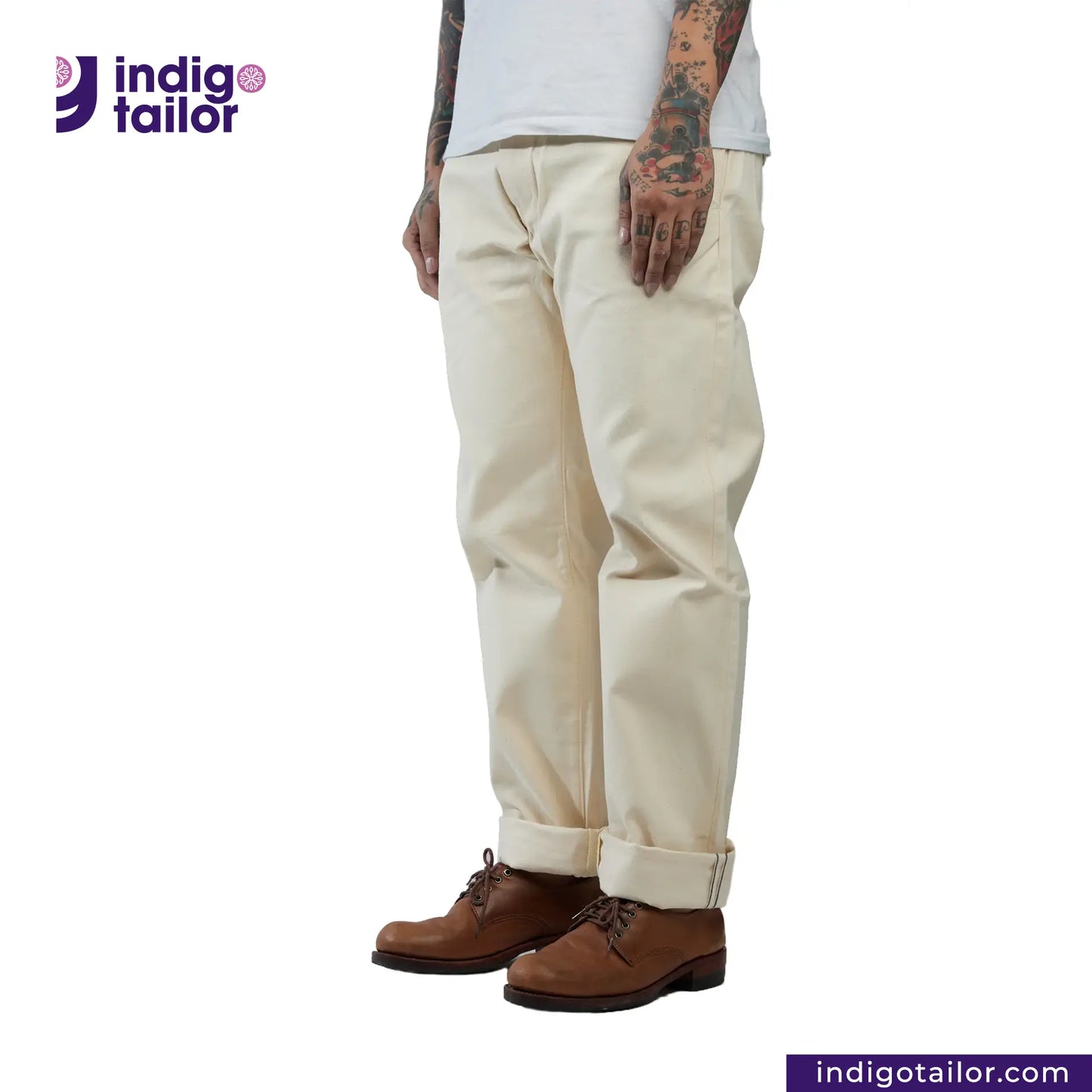 Person wearing Officer Trousers (Off-White) pants and brown shoes with 'indigotailor' logo.
