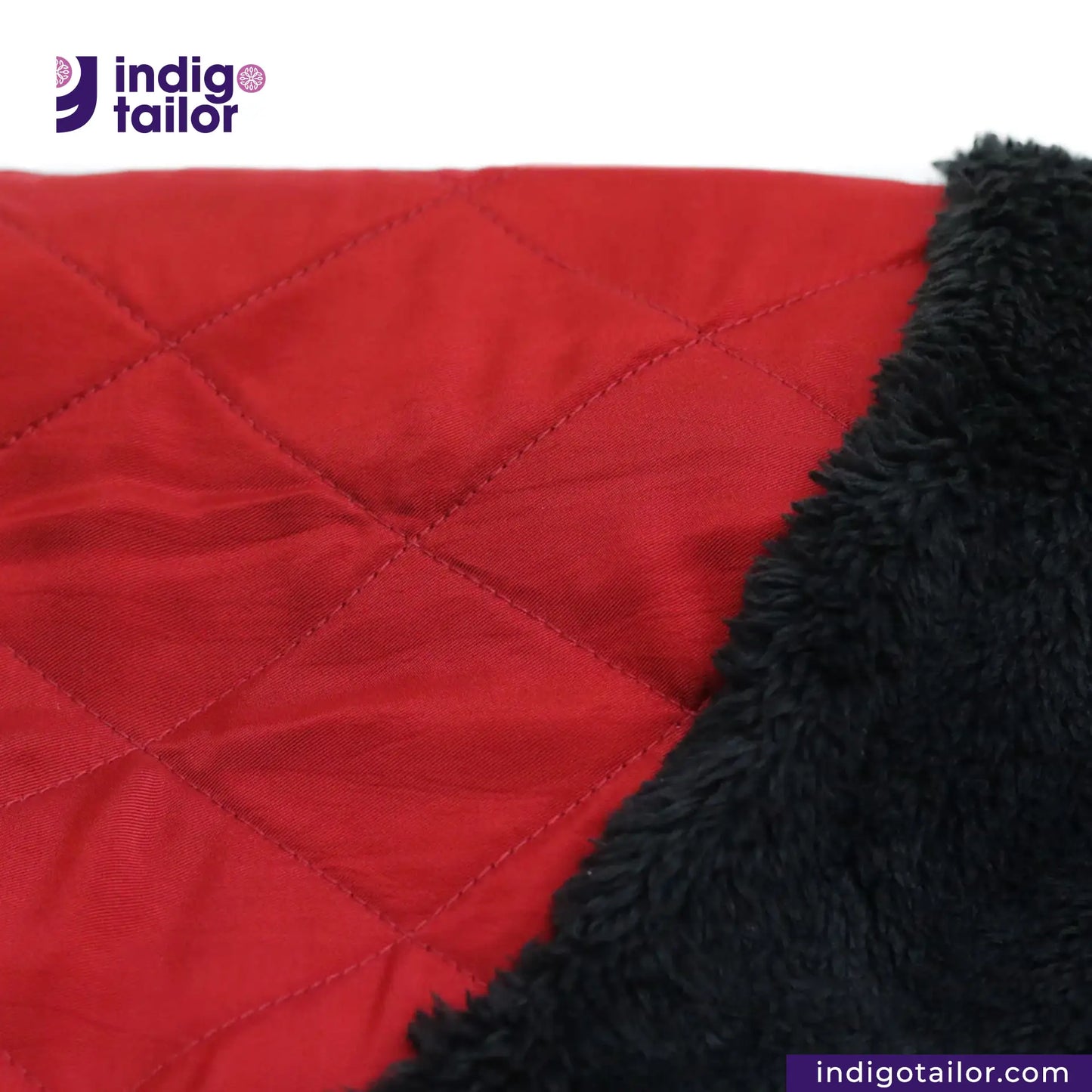 Close-up of SHERPA LINED WAXED CANVAS TRUCKER JACKET with black fluffy texture, featuring Indigotailor logo.