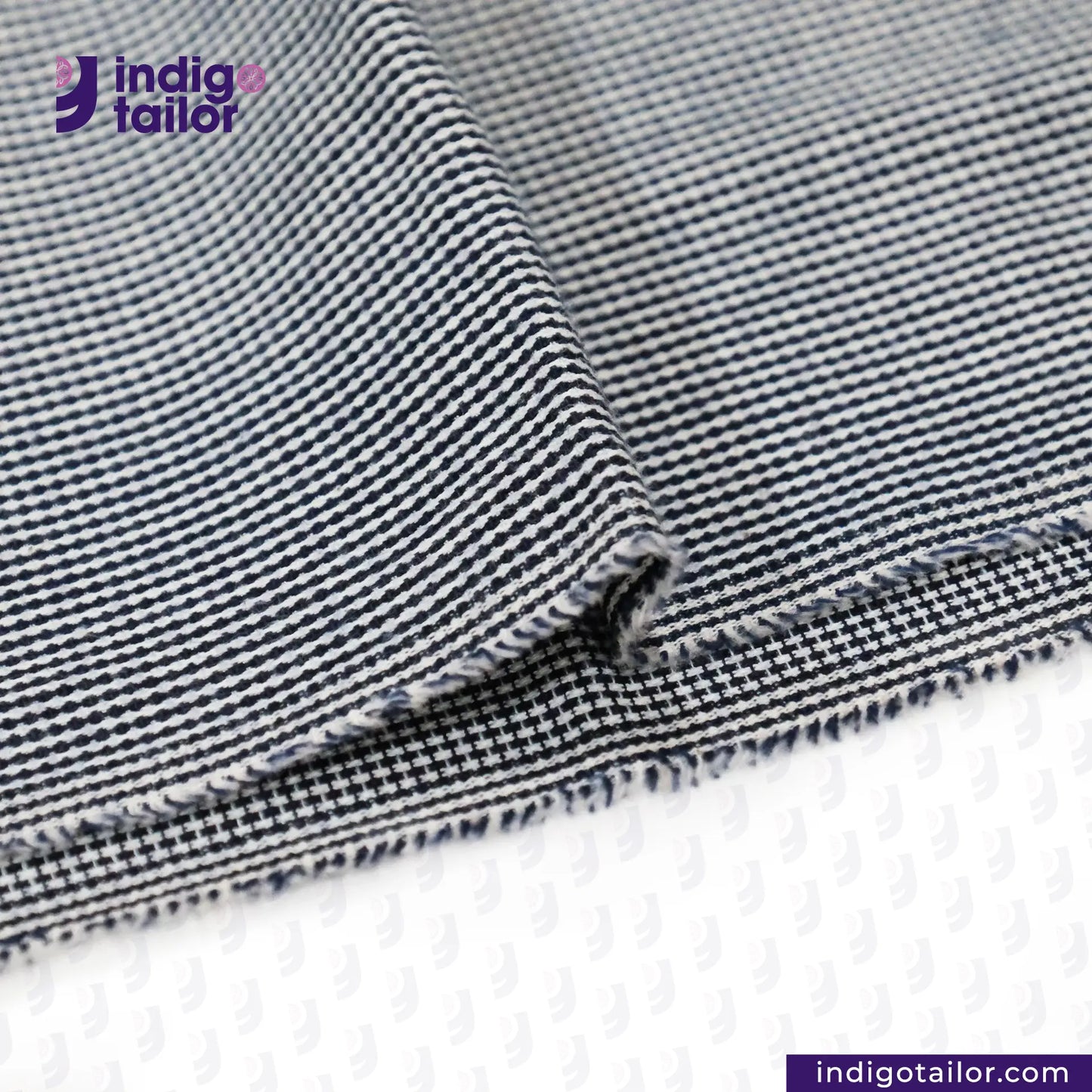 SUMMER SASHIKO DOBBY fabric with a checkered pattern on a white background, featuring the Indigotailor logo.