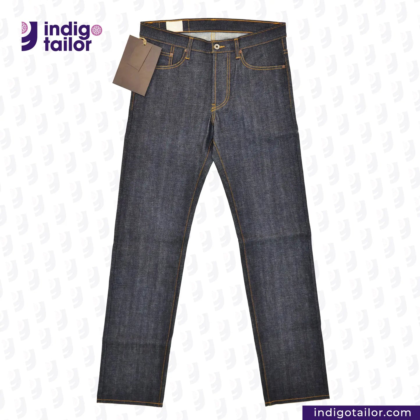 Pair of VINTAGE SLUB DENIM jeans with a tag on a white background, featuring the 'Indigotailor' brand.