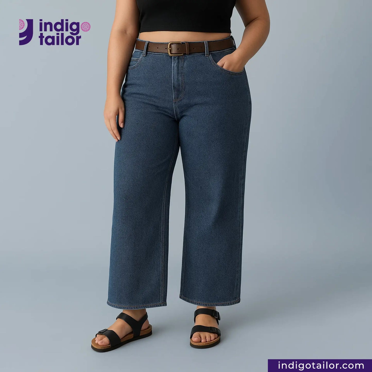 Person wearing WASHED VINTAGE SLUB SELVEDGE DENIM jeans with a gray background and 'Indigotailor' branding.