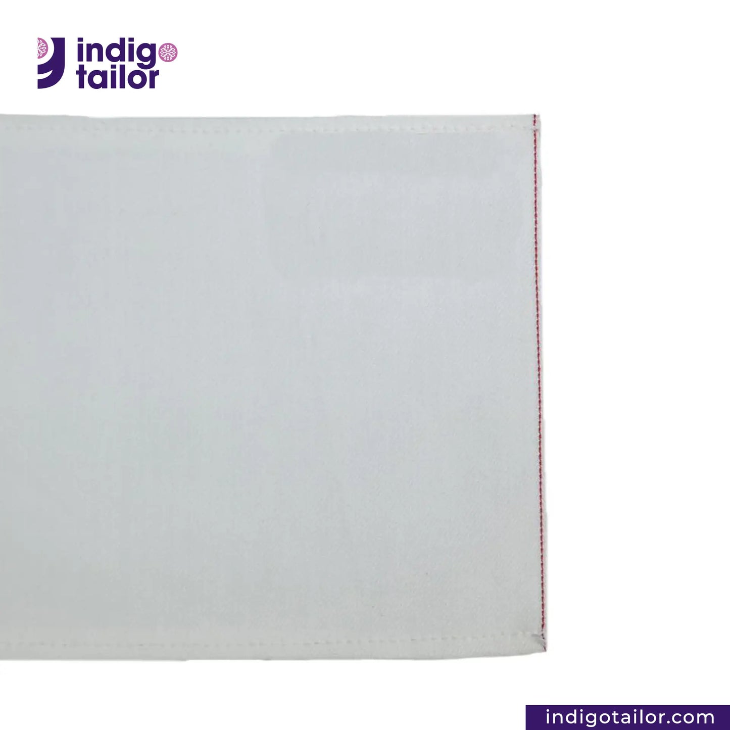 WHITE DENIM DOTTED RED SELVEDGE fabric swatch with a visible brand logo on a white background