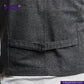 Close-up of a BLACK TWEED WORK VEST with a visible brand logo on a white background
