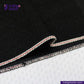 Close-up of BLACK X BLACK SELVEDGE DENIM fabric with white and red trim, branded 'Indigotailor'.