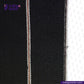 Close-up of BLACK x BLACK SEVLEDGE DENIM fabric with a visible brand logo at the top left corner.