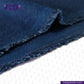 Close-up of BRUSHED INDIGO VIBRANT BLUE fabric with 'Indigotailor' branding.
