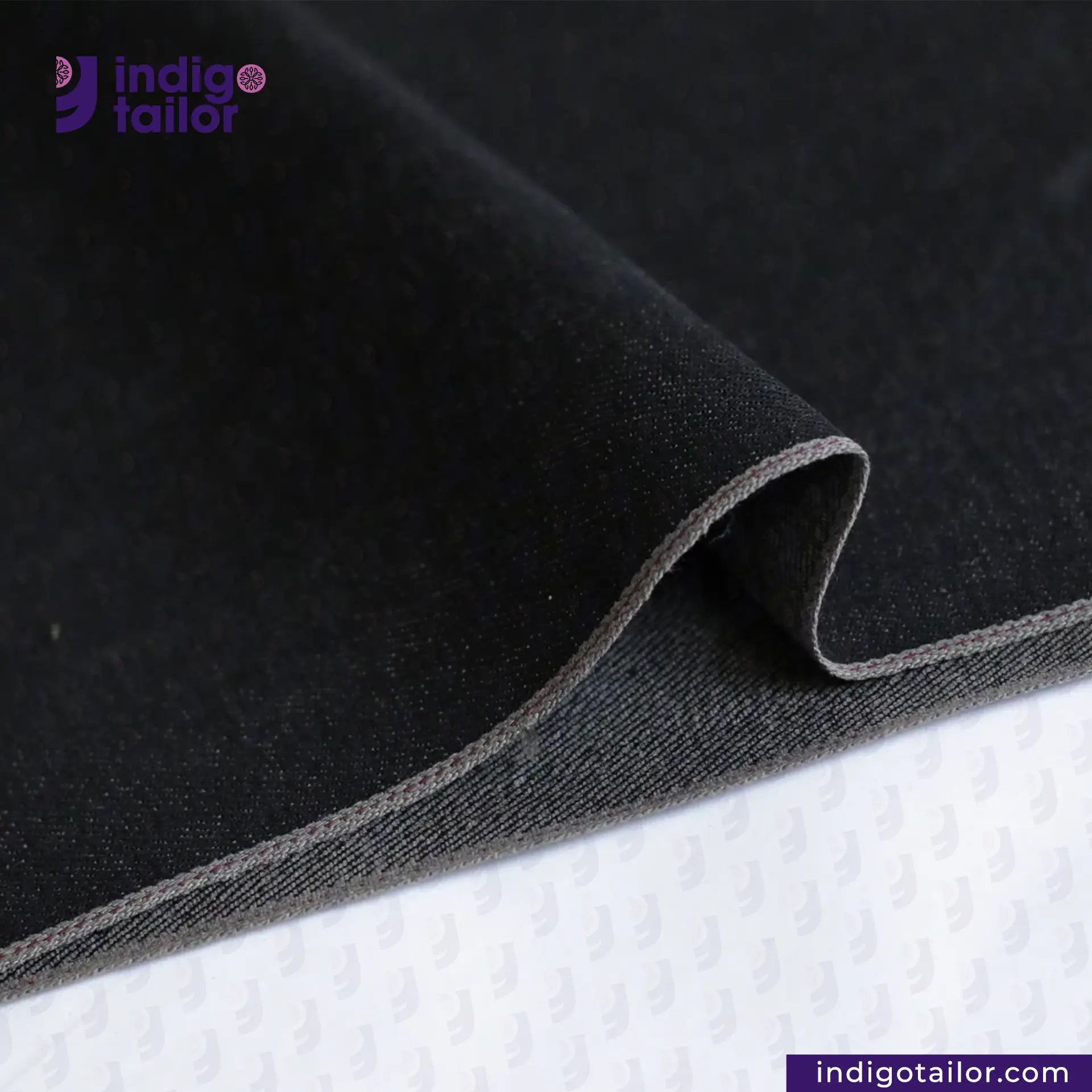 CHARCOAL SMOKE BLACK SELVEDGE DENIM fabric with a visible brand logo on a white background