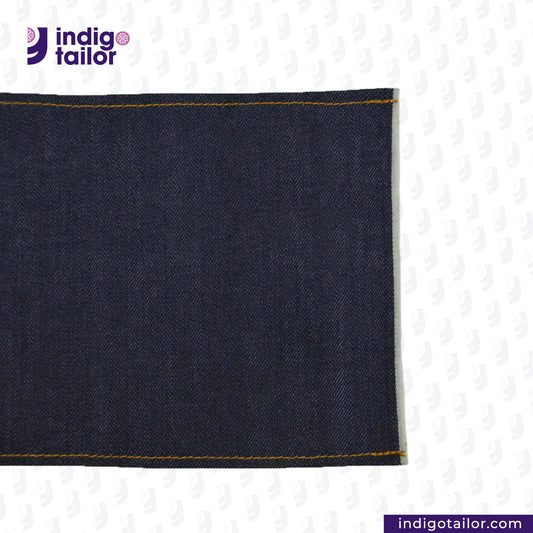 Close-up of COMFORT STRETCH WHITE SELVEDGE fabric with 'Indigotailor' logo and website URL.