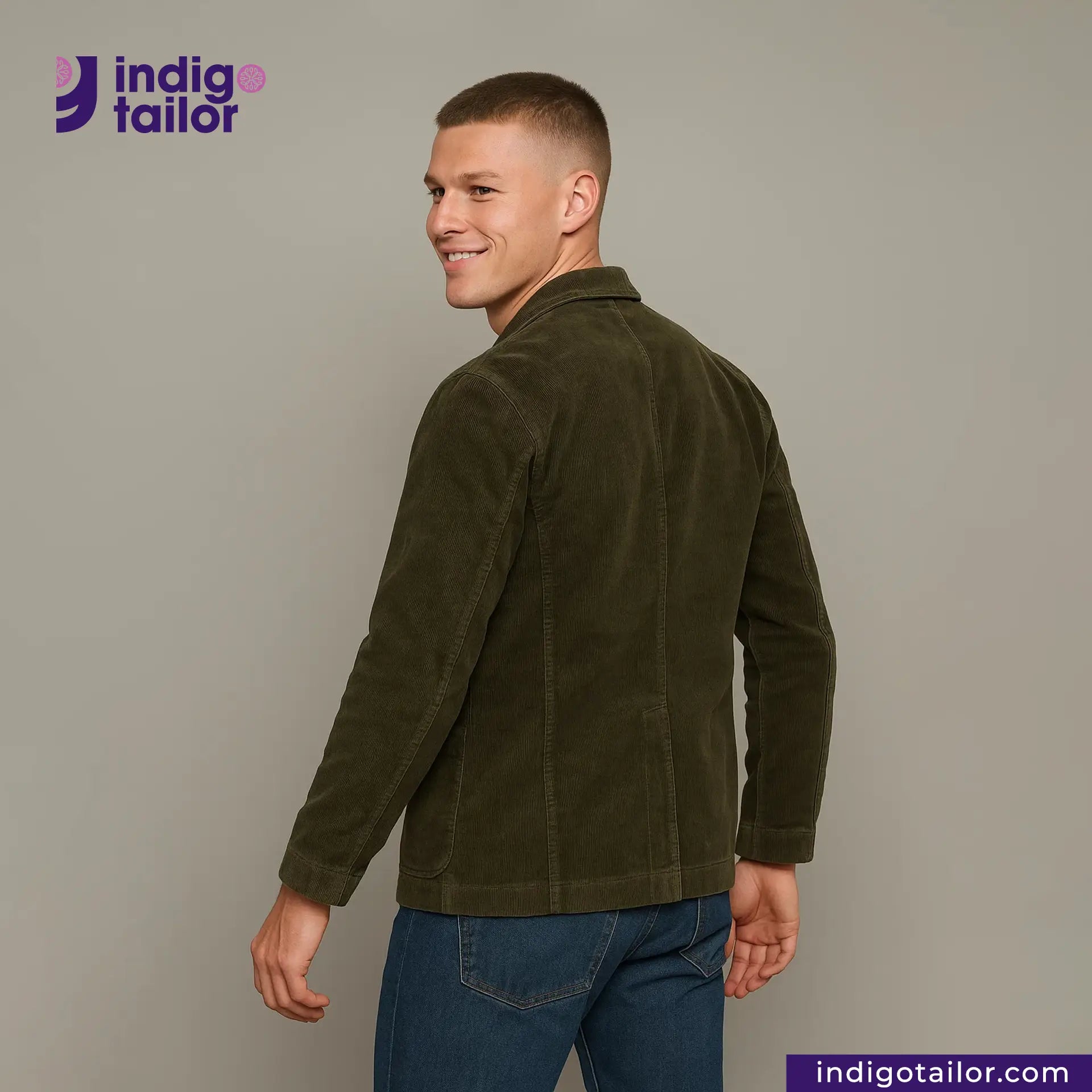 Man wearing a CORDUROY CHORE BLAZER (OLIVE) with 'Indigo Tailor' logo on a gray background