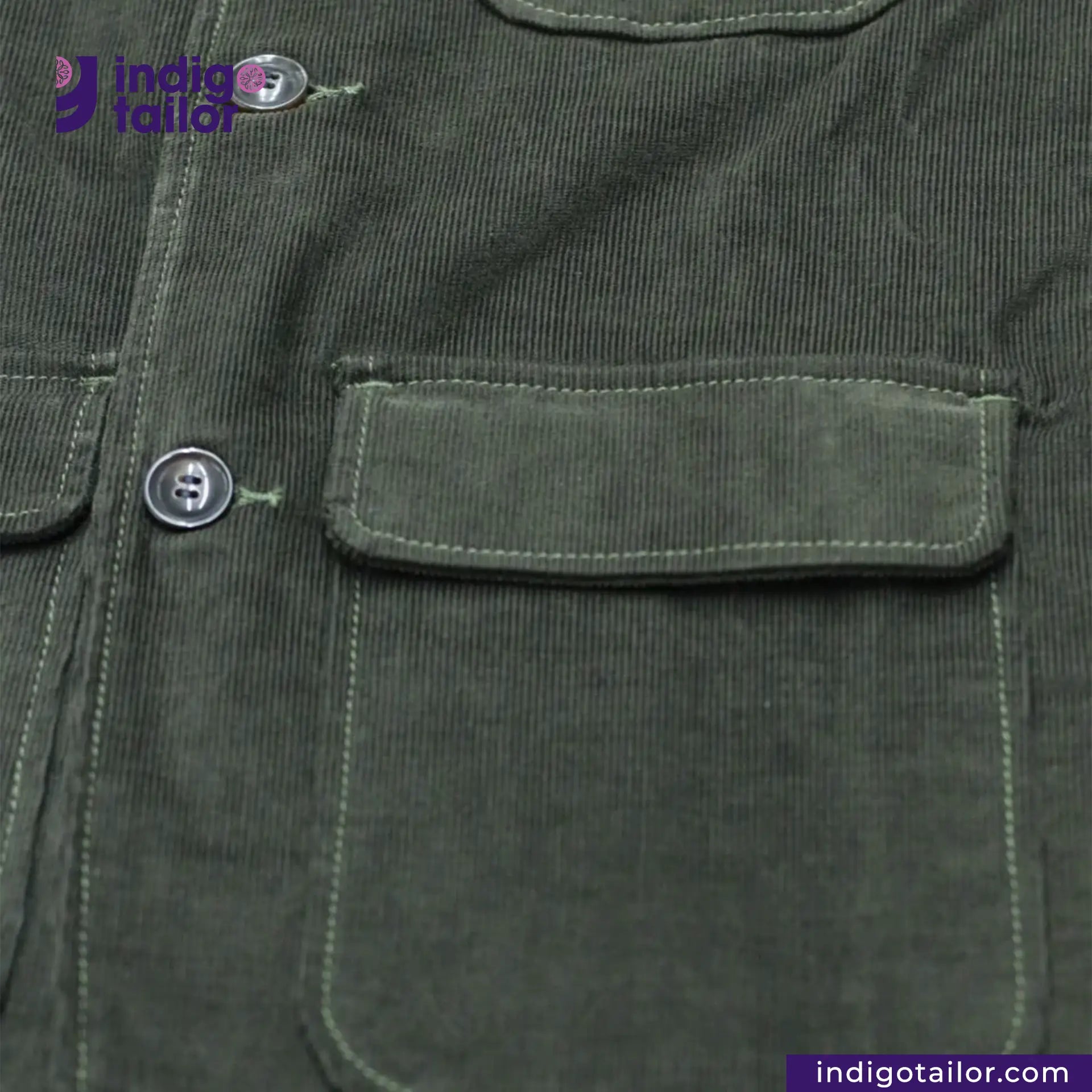 Close-up of a CORDUROY CHORE BLAZER (OLIVE) with a pocket and button, featuring the Indigotailor logo.