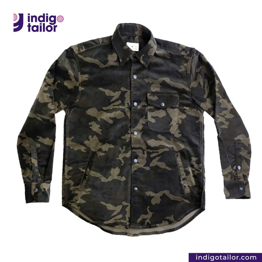 CORD CAMO OVERSHIRT Camouflage shirt with button details on a white background, featuring the Indigotailor logo.