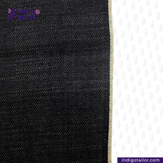 Close-up of CROSS HATCH DENIM WHITE SELVEDGE fabric with a brand logo on a white background
