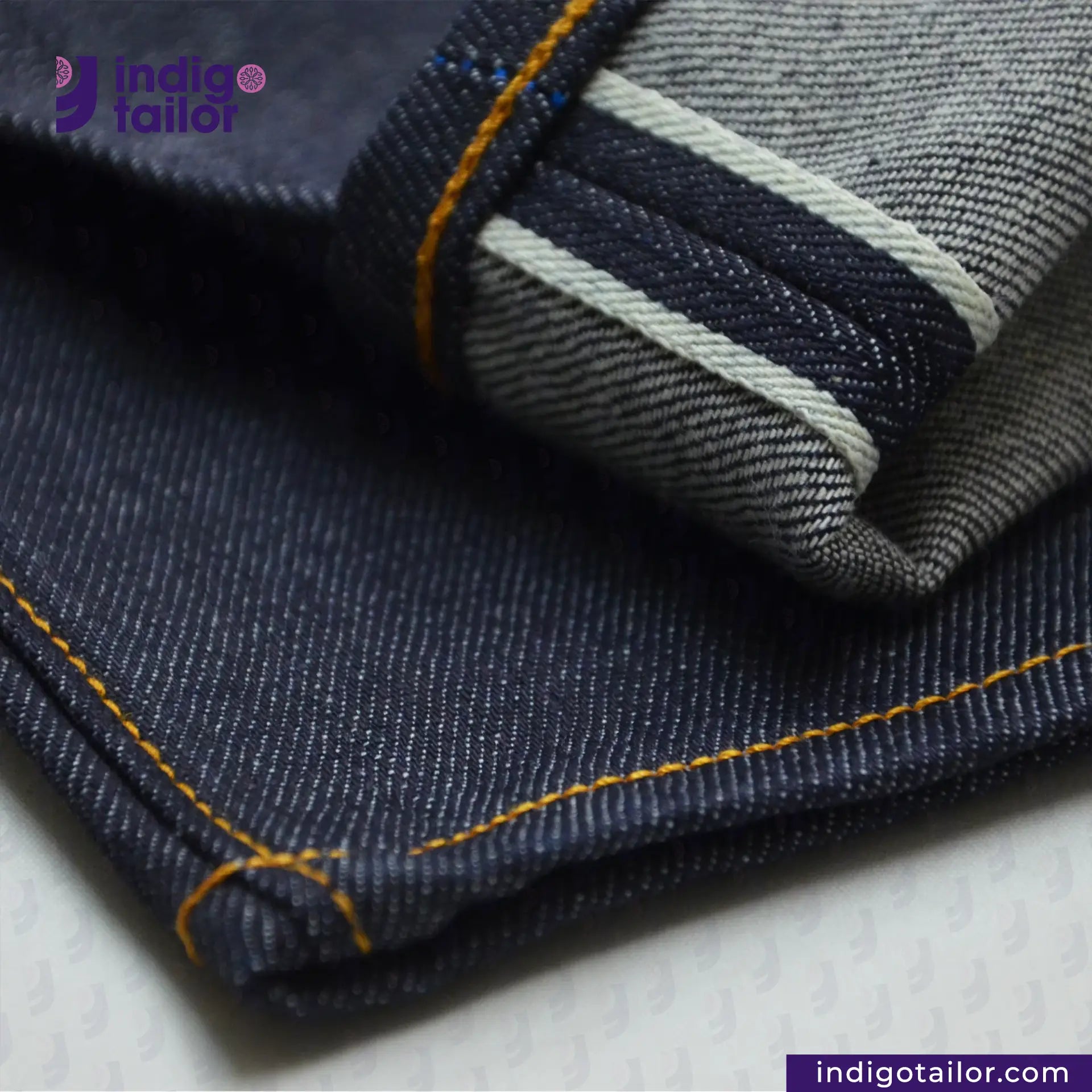 Close-up of Comfort Stretch Denim jeans with a brand logo in the corner.