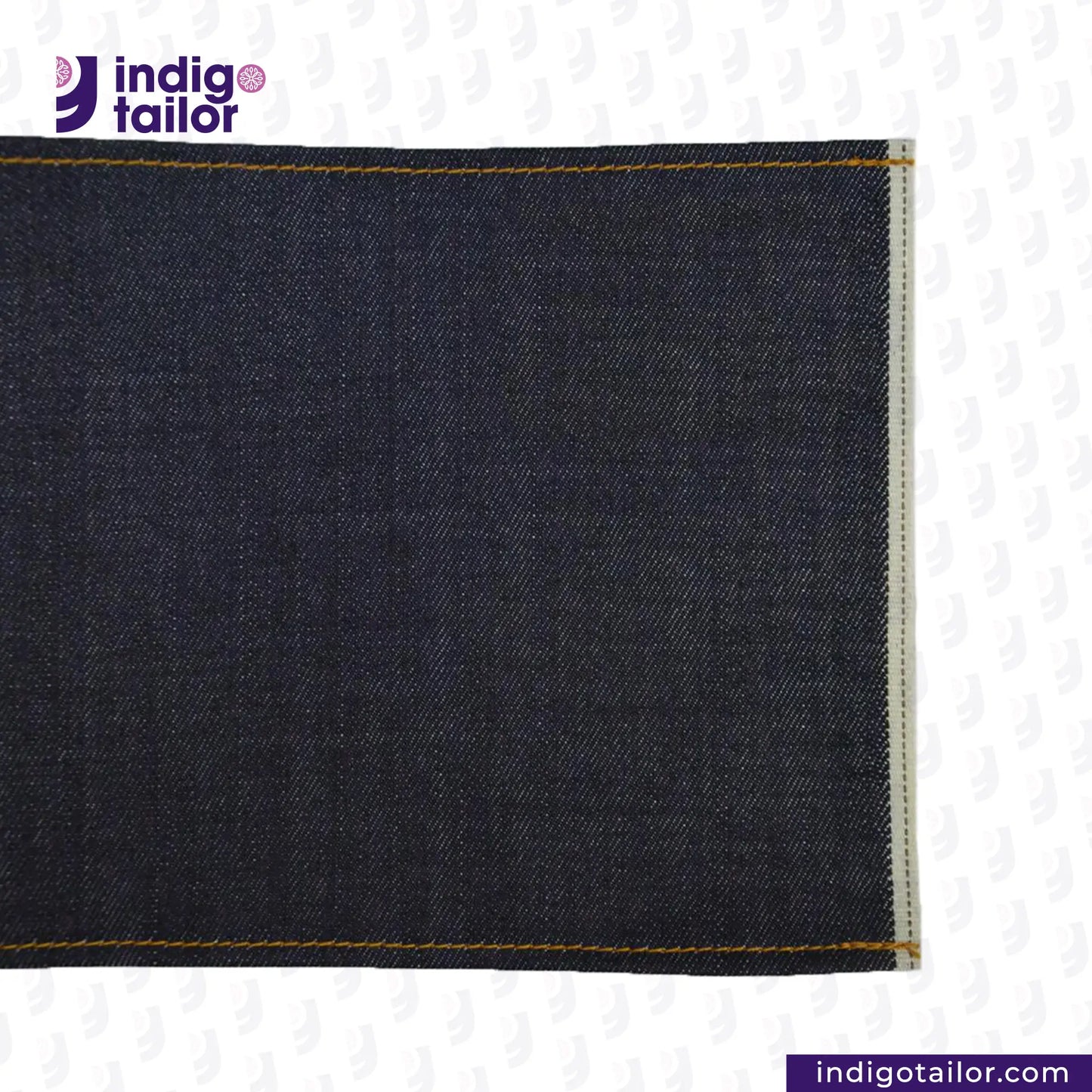 Close-up of dark DEEP INDIGO DOTTED BRONZE SELVEDGE fabric with 'Indigo Tailor' logo and website URL.