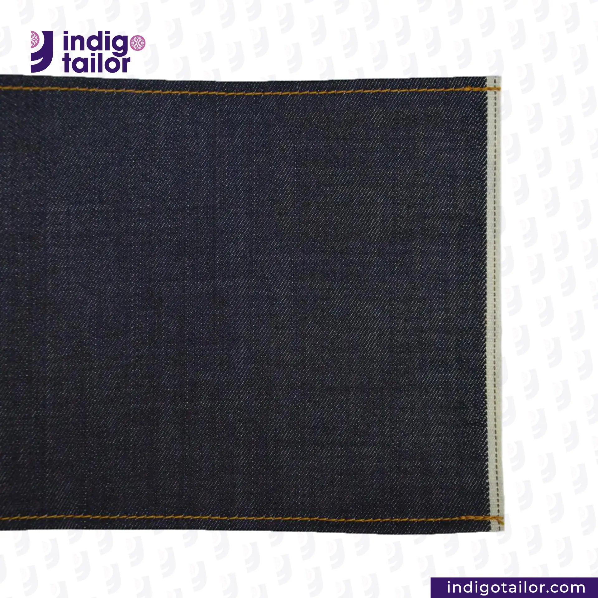 Close-up of dark DEEP INDIGO DOTTED BRONZE SELVEDGE fabric with 'Indigo Tailor' logo and website URL.